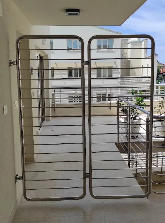 Double wing exterior doors and fence
